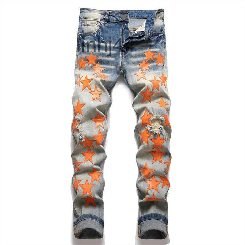 Dżinsy męskie dżinsy dla mężczyzn męskie Rozryte Orange Stars Regular Fit Lett Haftery Fly Fly Black Medium Pencil Pants Designer Hole Slim Rippedo