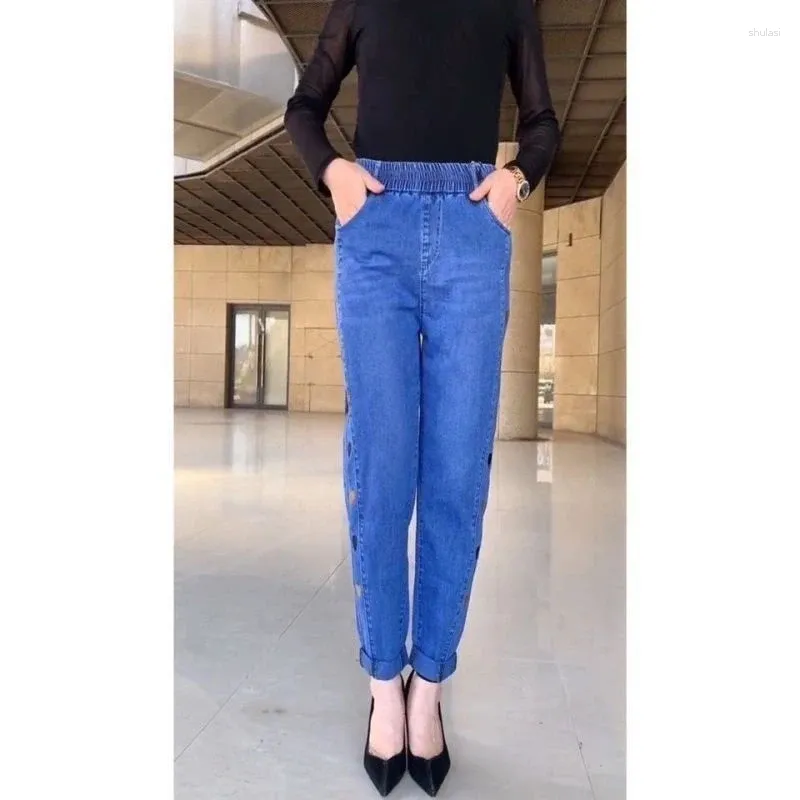 Jeans pour femmes printemps été couleur unie mode femmes haute rue poches décontractées brodées taille élastique tout-match haren pantalon