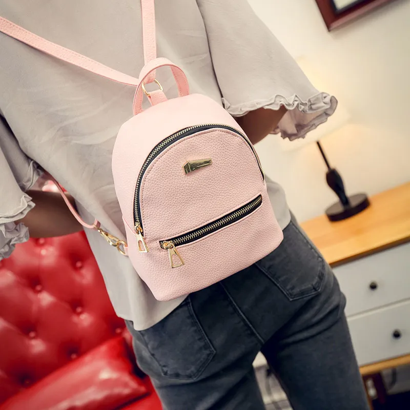anti theft light pink leather backpack Women's Genuine Anti-Theft Small & Elegant Julie bags 0.65 kg / 1.43 lbs Pacsafe CX anti-theft mini backpack