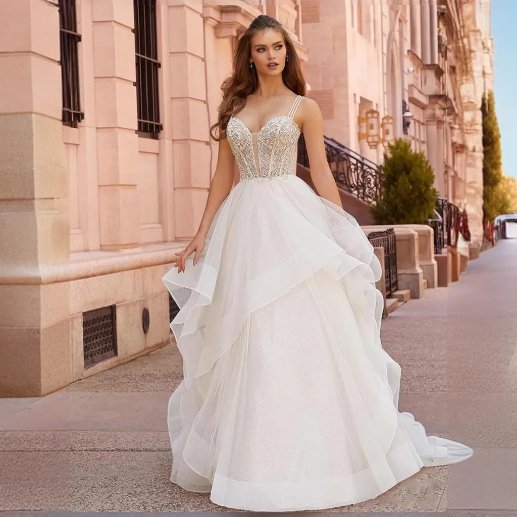 Elegant Spaghetti Strap Ball Gown Wedding Dress with Open Back