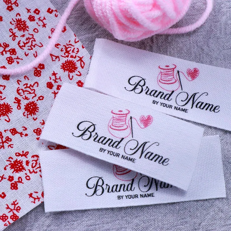 custom dress tags Printed Fabric Labels melding practicality with enhanced brand prestige. Custom satin clothing tags for