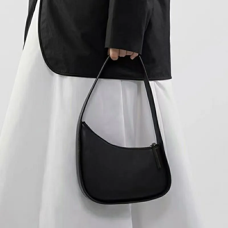 ショルダーバッグ・ポシェット THE ROW HALF MOON SHOULDER BAG IN NAPPA THE ROW Half Moon leather shoulder bag | NET-A-PORTER