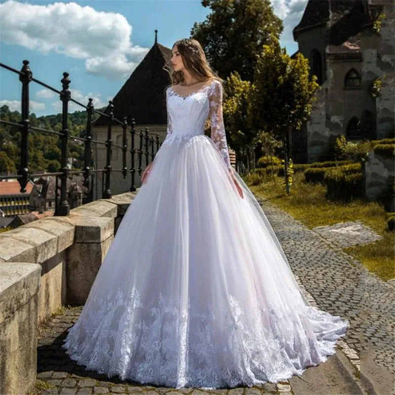 Elegant Ivory White Lace Applique a line wedding dress with Long Sleeves and Court Train for Bride - 2021 Garden Gown with Illusion Jewel Neckline and