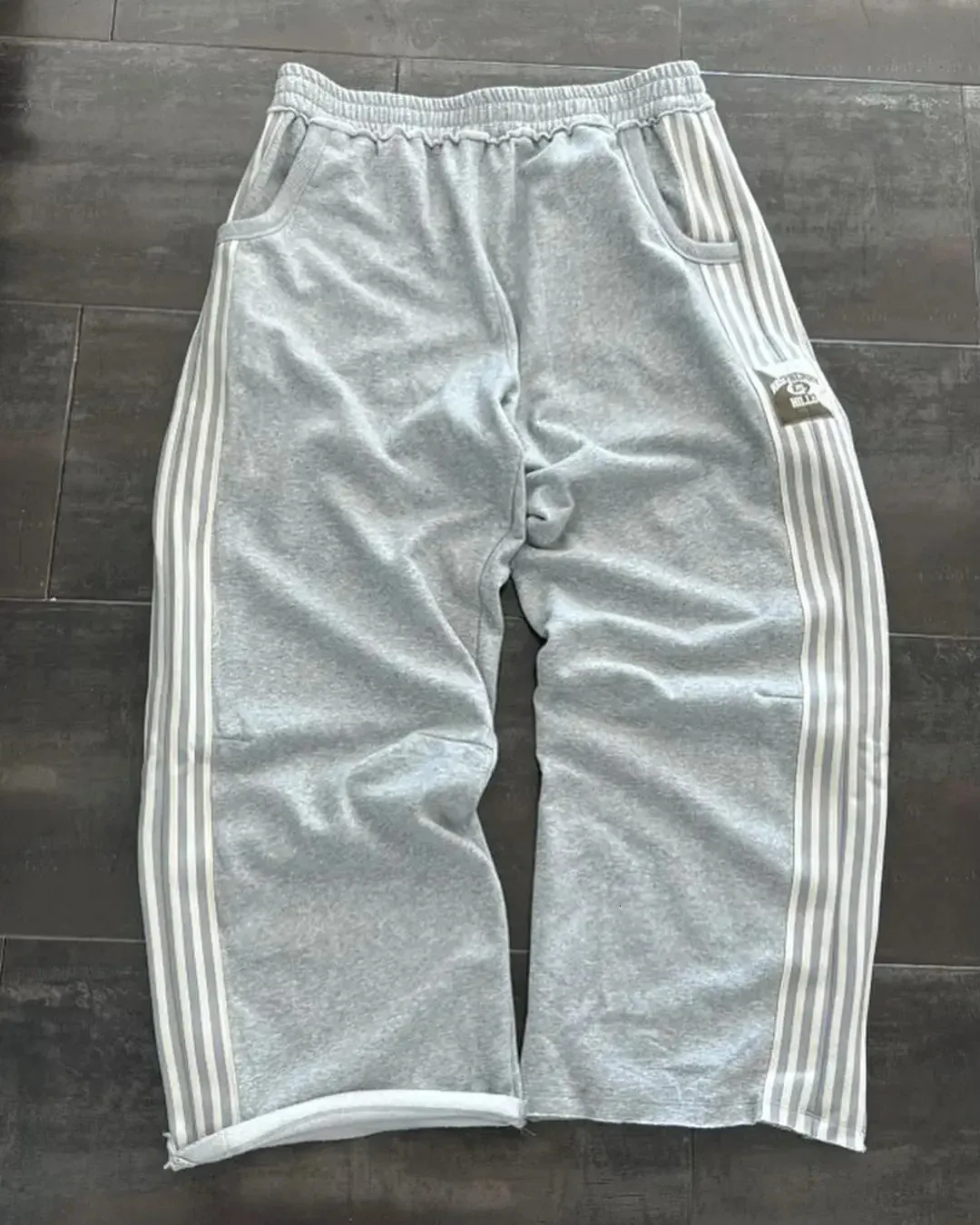 DHgate.com:American Hip-Hop Loose Striped Splicing Wide Leg