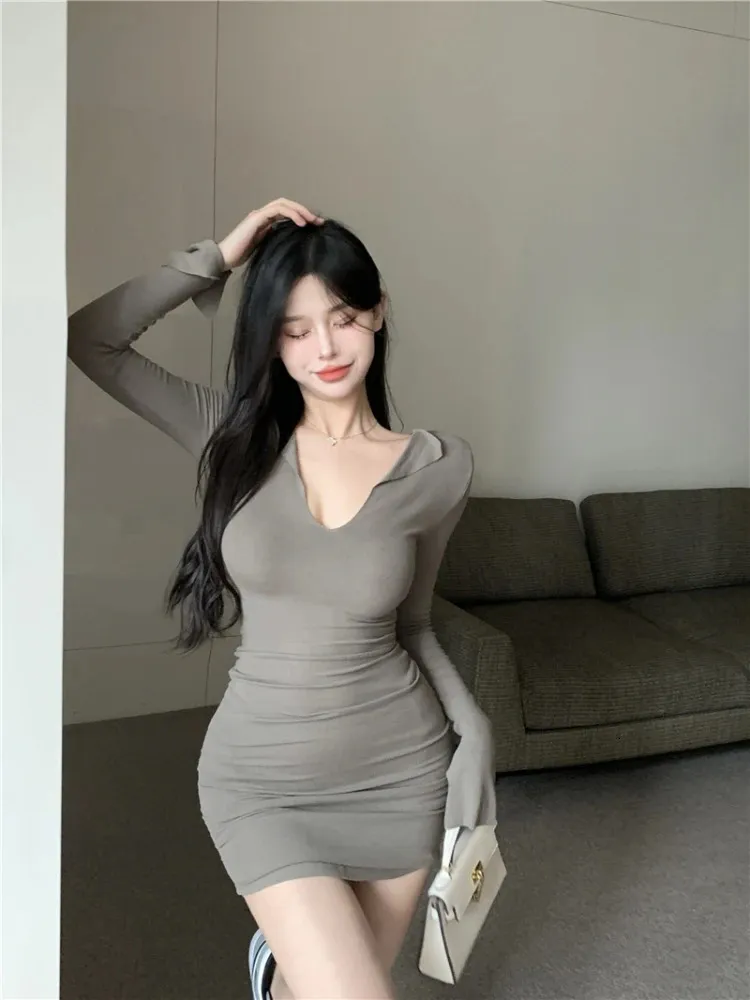 Korean Bodycon Mini Dress with V-Neck and Pleated skirt - Elegant and Sexy Women's Fashion Accessory