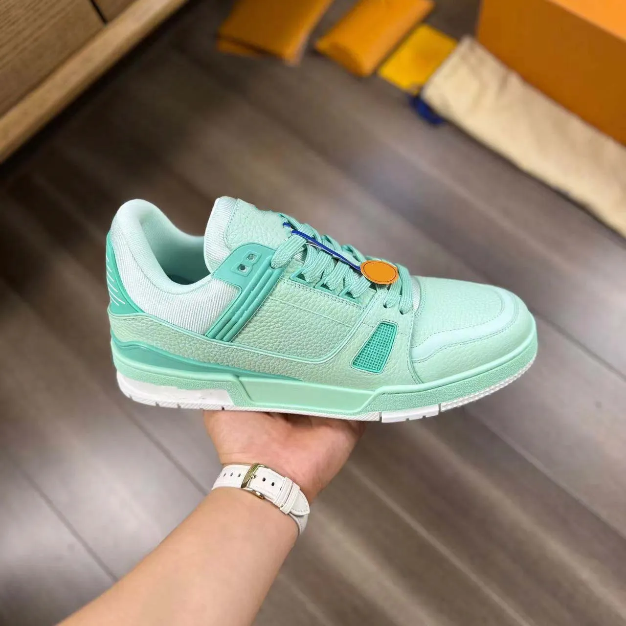 Green designer trainers best sale
