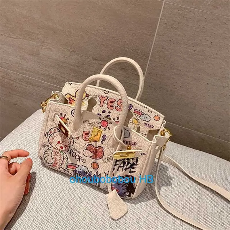 DHgate.com:Unique Graffiti Tote Bag - Designer Leather