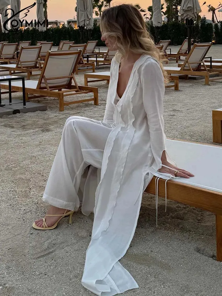 Elegant White V-Neck Ruffled Lace-Up Dress with Side Slit and Straight Pants Set for Women. Elegant White V-Neck Ruffled Lace-Up Dress with Side Slit and Straight Pants Set for Women.