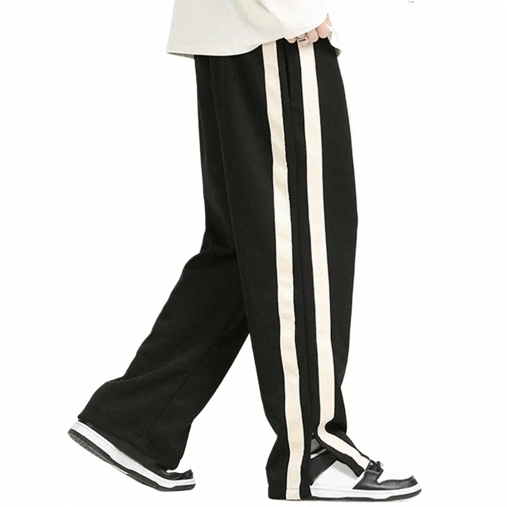 Sweatpants with stripes reagent on one leg