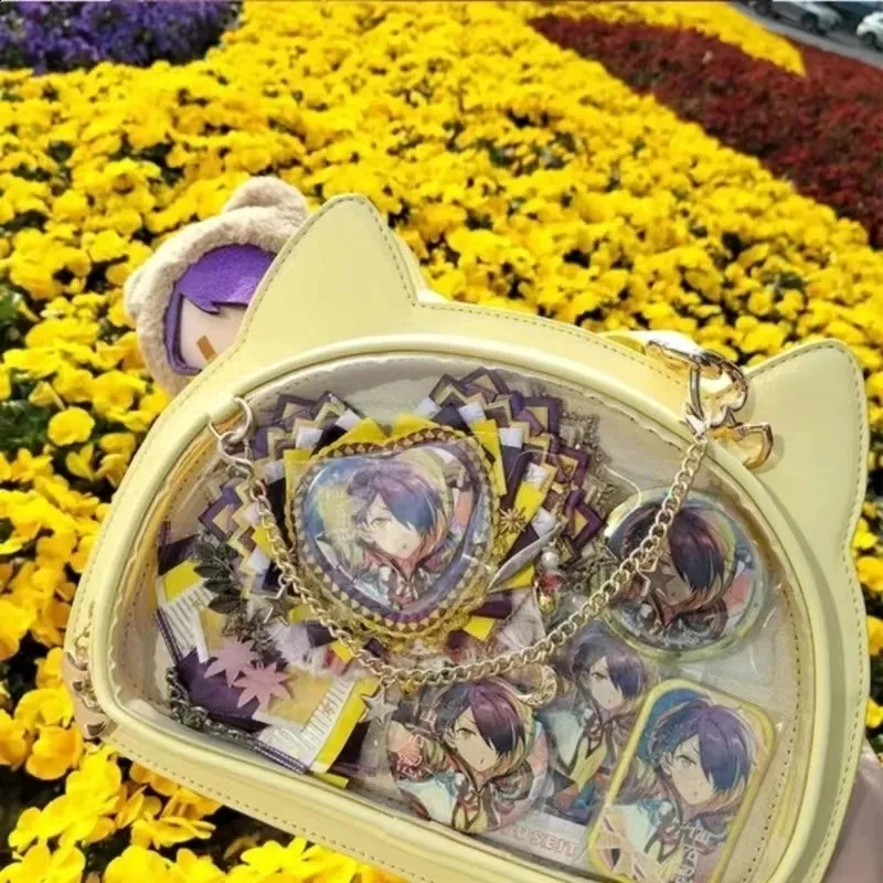 au - au ガラケー iida lotta yellow 岩崎一郎デザイン、携帯にさりげない遊び心――iida新端末「lotta