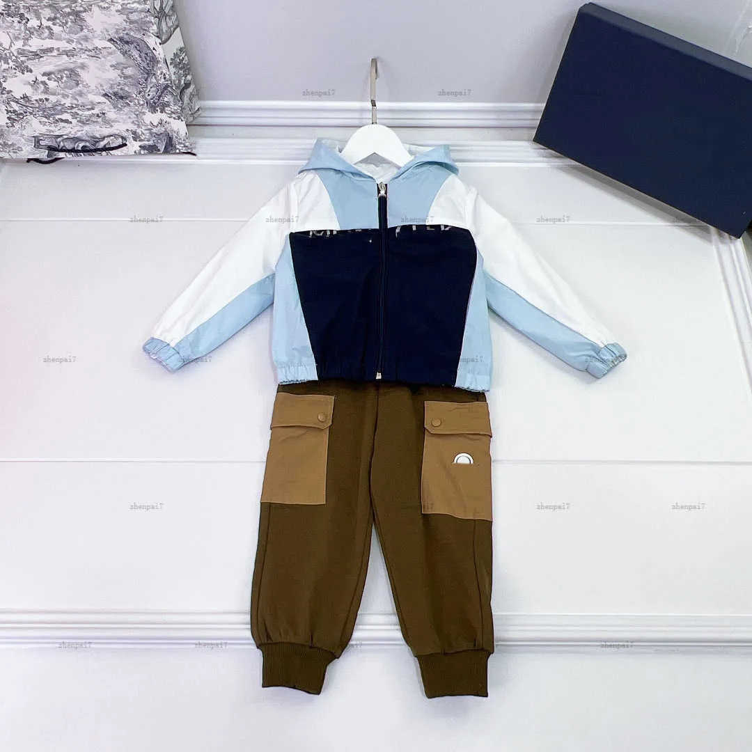 Top Tracksuits baby Autumn Set Size 100 160 CM kids designer clothes Panel design hooded jacket and pocket sweatpants