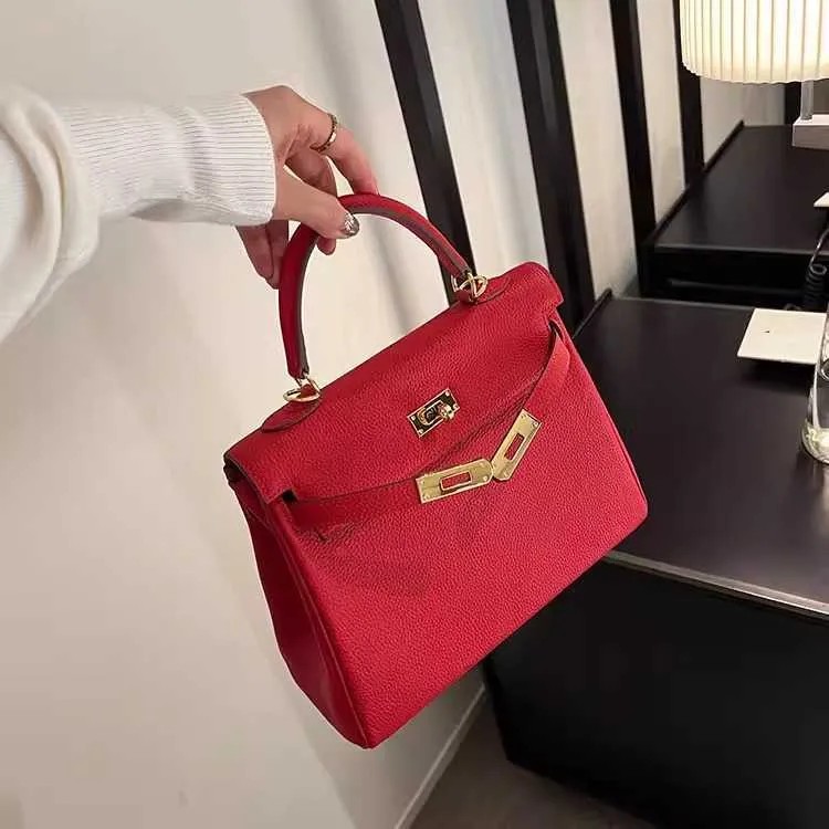 Designer Cowhide Red Shoulder Bag For Women Light Luxury
