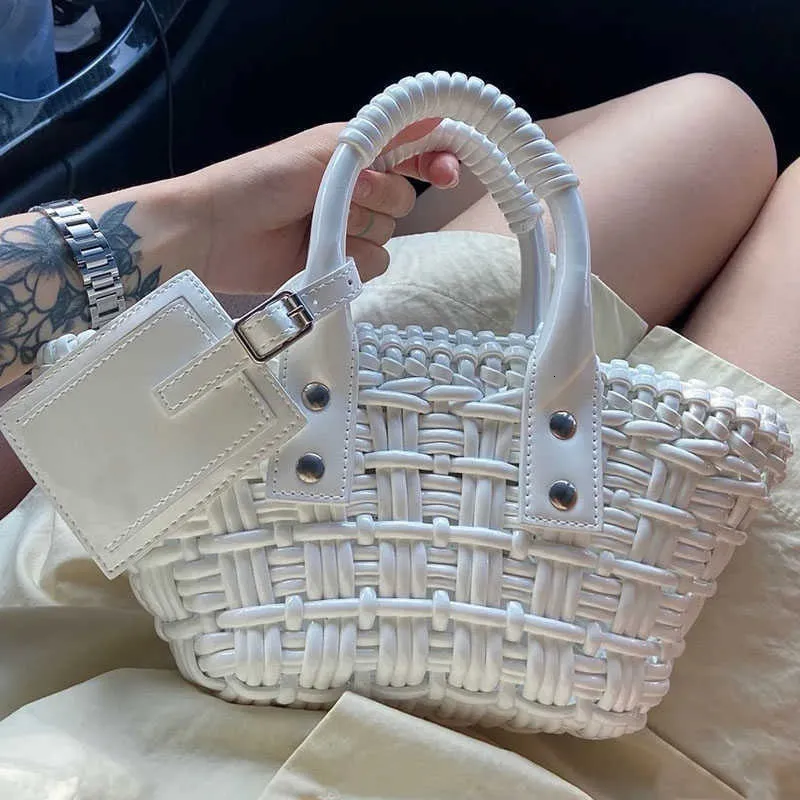 ハンドバッグ CROCHET LOGO HANDBAG Logo crochet shoulder bag in blue - Miu Miu | Mytheresa