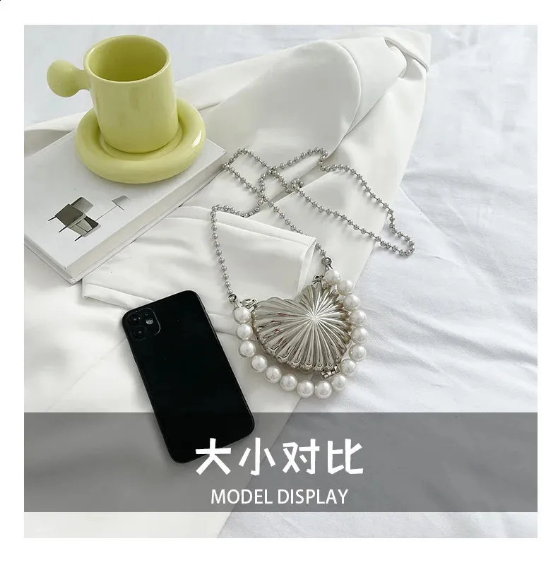 【AAKE】HEART BEAD CROSSBODY BAG DHgate.com:Pearl Beaded Mini Heart-shaped Crossbody Bag for