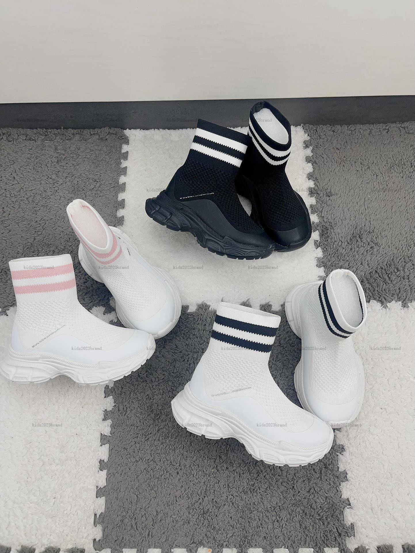 Sock boots with white stripe deals