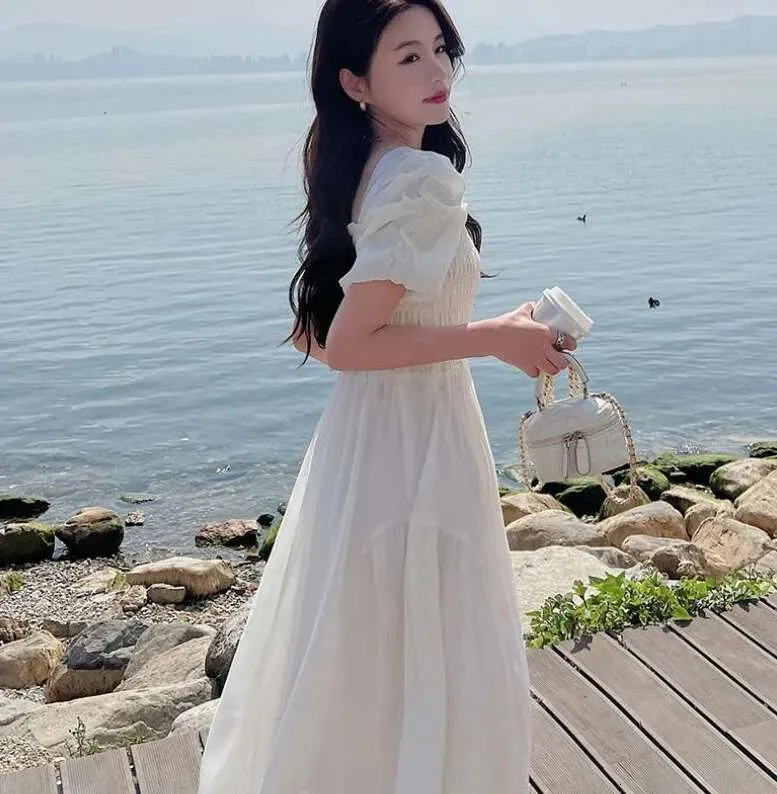 slim fit dress slacks Petal and Pup Women's Annette Puff Sleeve Shirred Midi Dress main image 0