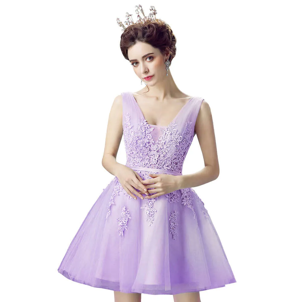 Elegant, Sleeveless, Tulle-like Mini Dress with Lace Detailing Elegant, Sleeveless, Tulle-like Mini Dress with Lace Detailing