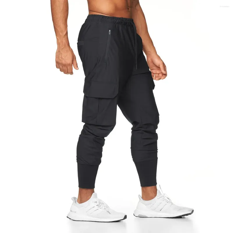 Calças masculinas ginásio homens correndo esporte jogging sweatpants casual treinamento ao ar livre calças de fitness secagem rápida com bolsos de zíper