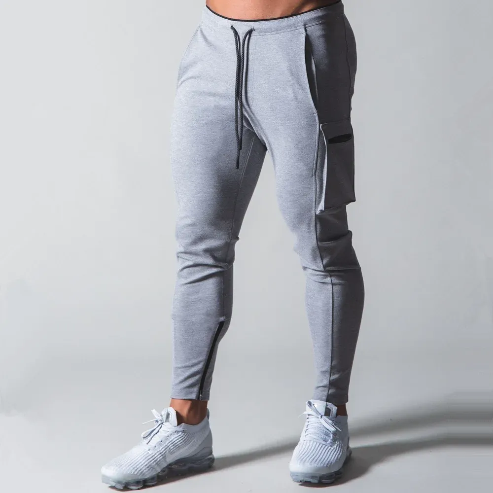 Pantalons de survêtement Coton décontracté pantalon slim hommes Joggers pantalons de survêtement automne solide pantalon mâle survêtement gymnase Fitness entraînement musculation bas