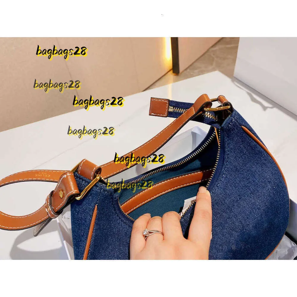 Aktentaschen Kosmetiktaschen Hüllen Frühling Sommer zeigen die Cowboy-Buchstaben Alar-Tasche Handtasche Mode Retro große Kapazität Großhandel Luxusgüter Mode Baumwollstoff 2024