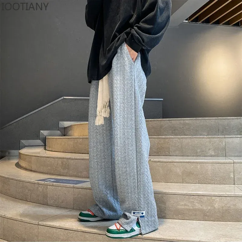 Byxor mode lös casual sido slits rakleg byxor vintage blå jacquard casual bottnar män high street sweatpants manliga kläder