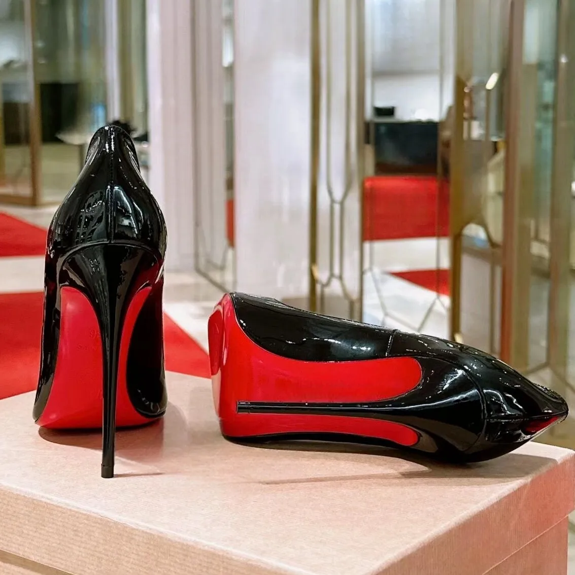 Shoe designer Louboutin wins legal battle to bare its red sole