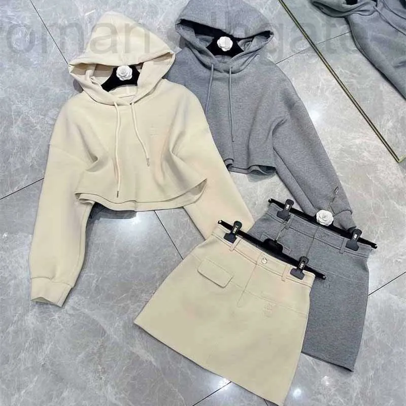 Two Piece Dress designer 2024 Early Spring New Nanyou Gaoding Miu Simple and Casual Age Reducing Letter Embroidery Hooded Hoodie Half Skirt Set 04IF