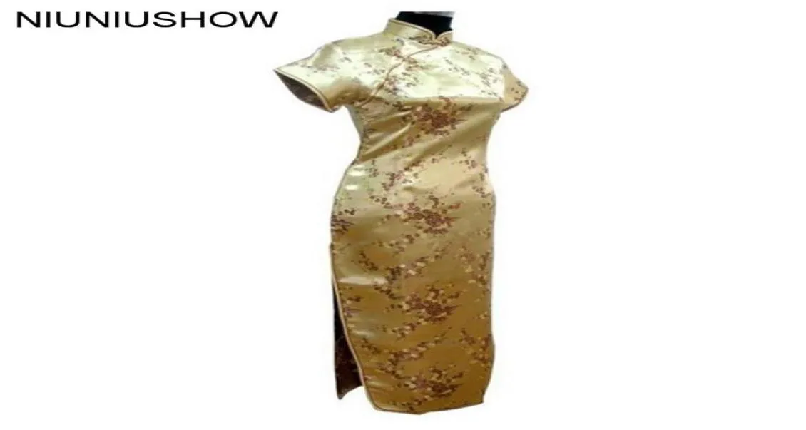 ゴールドの伝統的な中国のドレス女性