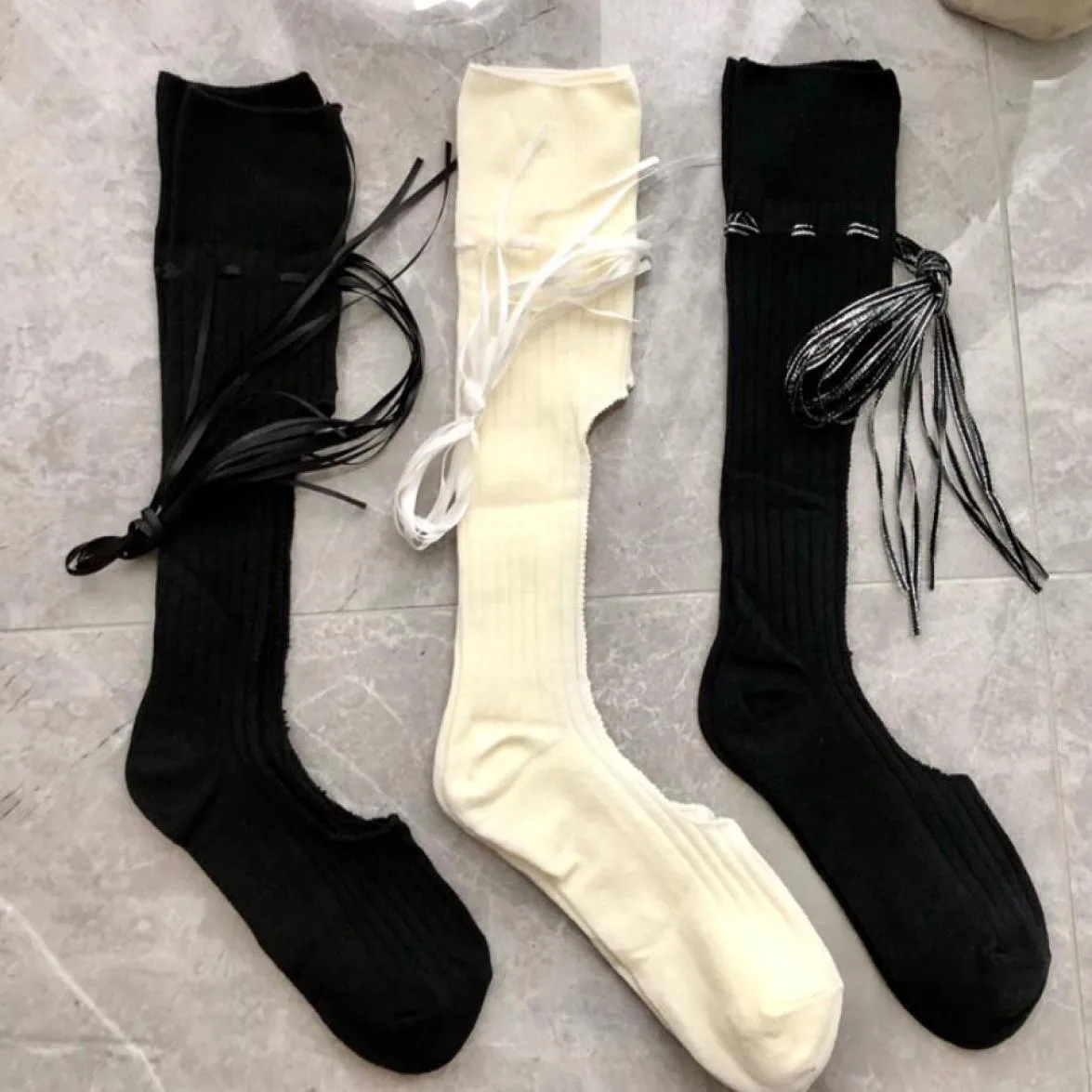 Projektant bawełniany hosiery długie skarpetki pończochy dla kobiet 2022 Wiosna nowa moda lato damskie dziewczęta wielkie hole Ties Streetwear Sock S6681742