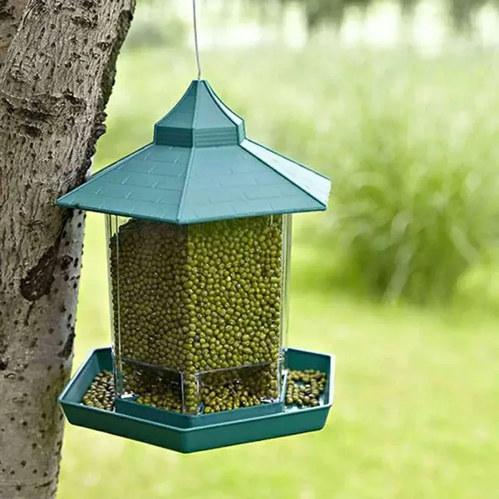 Fütterung hängende Wildvogel -Feeder wasserdichte Pavillon Outdoor -Behälter mit Hänge Seil Fütterung Haus Typ Vogelfutterleiter Aves Dekor