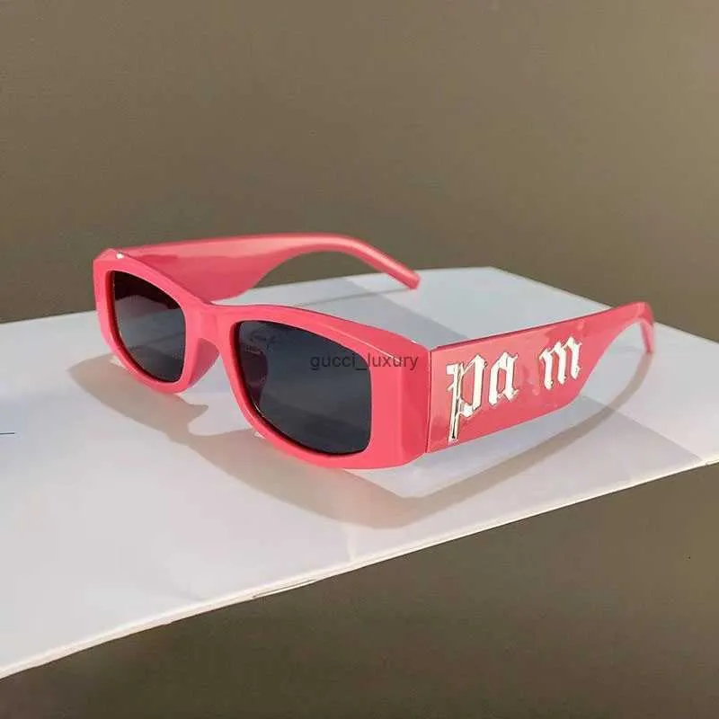 Женские дизайнерские мужские солнцезащитные очки с буквами в маленькой оправе нежно-розового цвета Palmangel