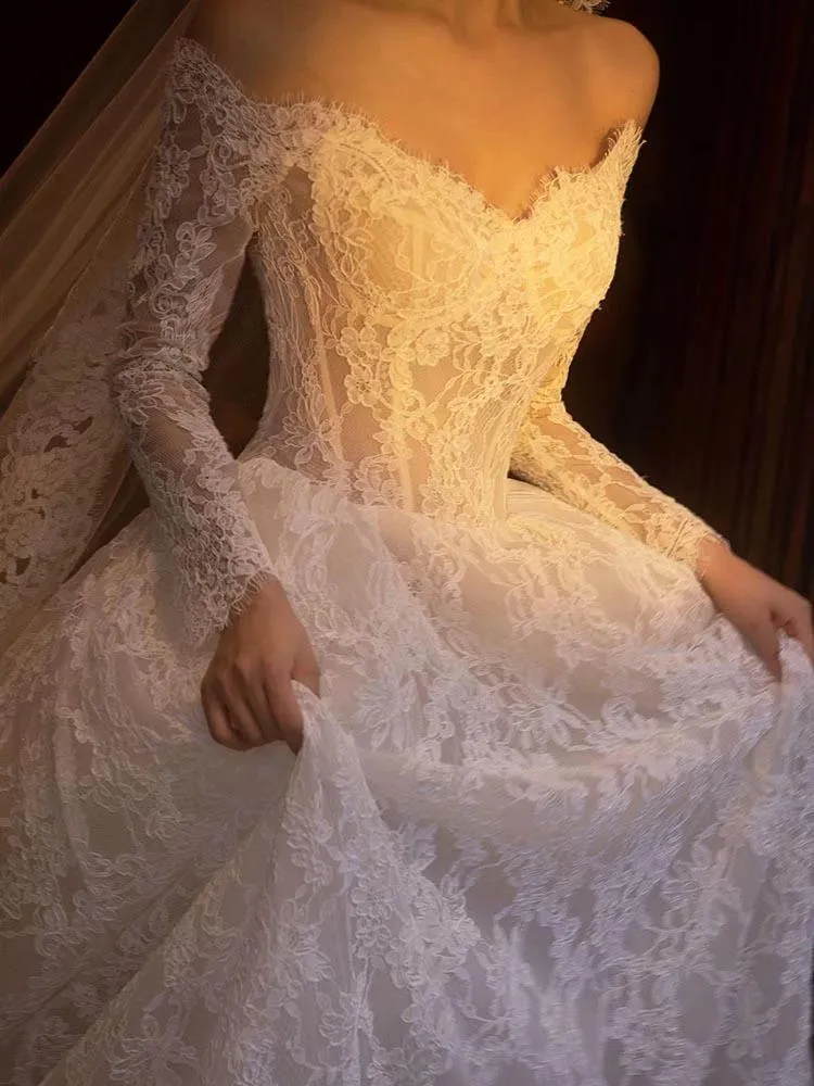 Prawdziwe zdjęcia koronkowa suknia ślubna 2024 NOWOŚĆ PRZYCHODZENIE Długie rękawy koronkowe wściekłe suknie ślubne Najwyższej jakości kwiatowy koronka