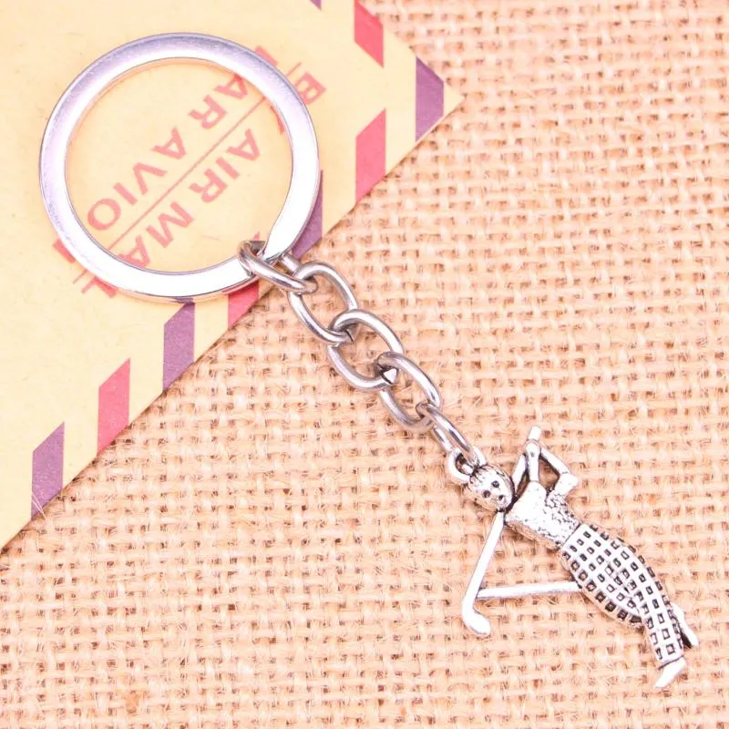 Nyckelringar 20st Fashion Keychain 31x20mm Golf Golfer Sporter hängsmycken DIY män smycken bil nyckelkedja ringhållare souvenir för gåva