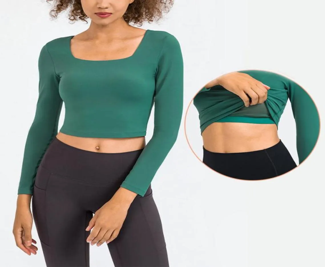 134 Camisas recortadas Corte entallado Copas acolchadas incorporadas Traje de yoga sexy Tops de manga larga Camisa de fitness Trajes elásticos amigables con la piel para estar en movimiento todos los días Top1897542