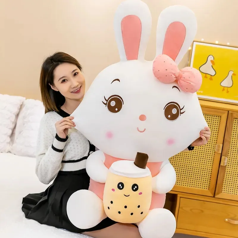 2024 40cm mignon poupées en peluche jouets lapin à pattes de pâques avec tasse de thé au lait en peluche animaux en peluche rose doux couché noble poupée oreiller coussin cadeau ouvert surprise