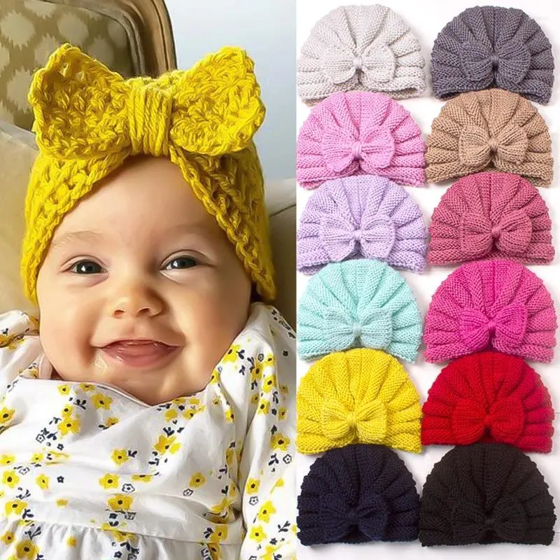 ヘアアクセサリーベビーガールのための結び付けられた帽子beanie bow headband幼虫生まれ冬の帽子温かいボンネットキャップマザーキッズ