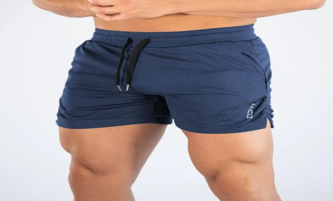 Pantaloncini da palestra Quick Dry Uomo Pantaloncini da corsa Fitness Uomo Bodybuilding Sport Palestra Pantaloni corti da allenamento in rete traspirante Jogger8999965