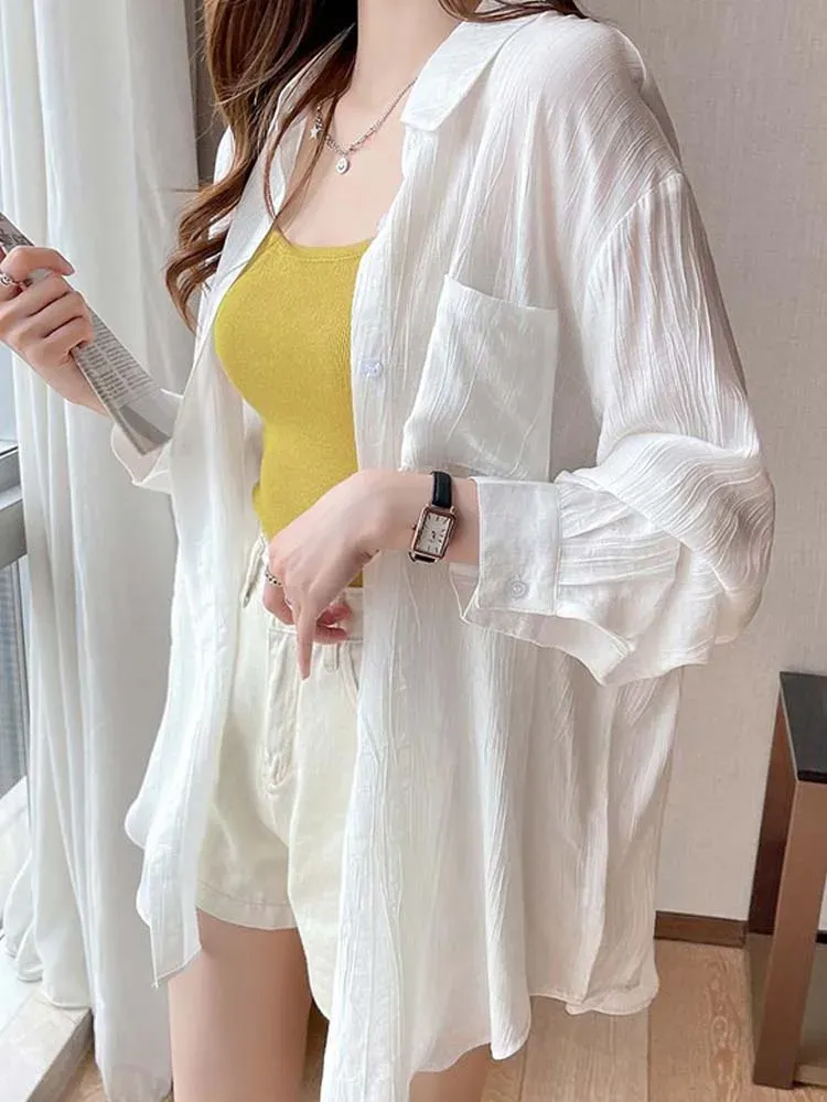 Koszula biała lodowa koszula Kobiet Koreańska moda swobodna krem ​​kremowy bluzki panie letnie długie rękawie ochrona przed słońcem cienkie topy