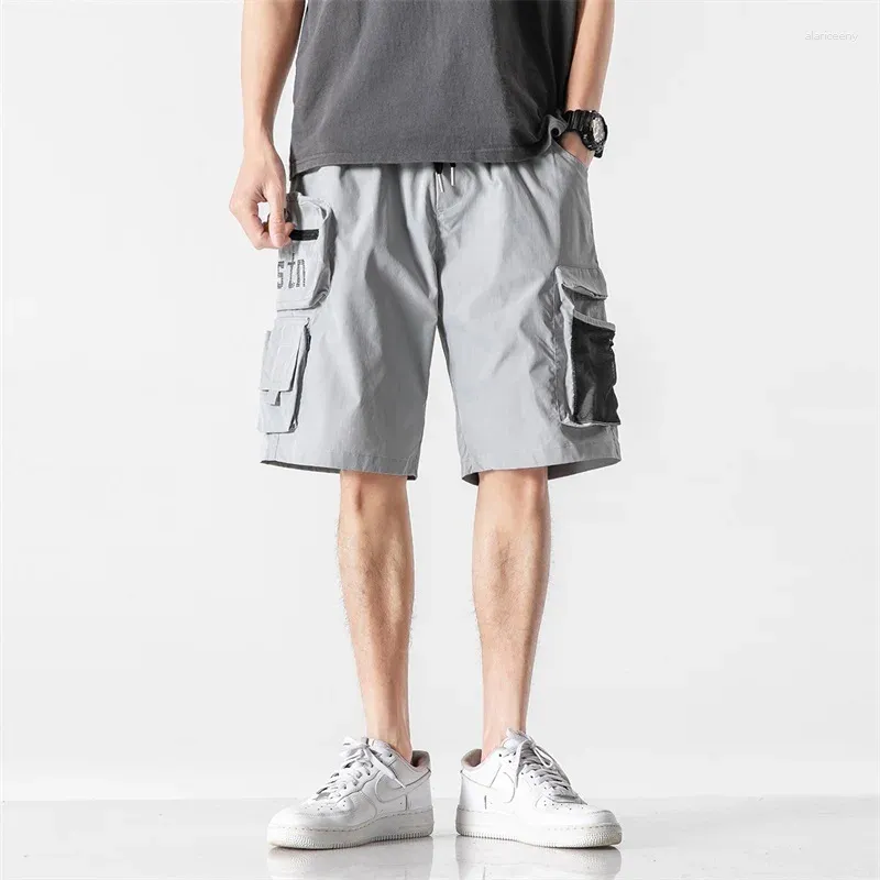 Shorts masculinos verão carga homens soltos moda casual multi-bolso algodão cor pura zíper elástico corda cintura joelho comprimento