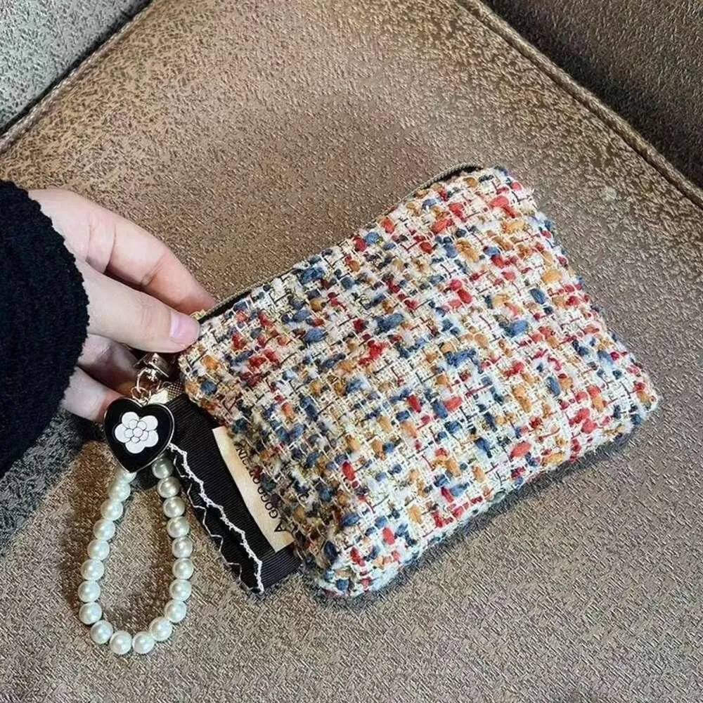2023 Niche Instagram Xiaoxiangfeng Mini portefeuille de rangement sac de maquillage Portable tricoté mignon petit 910761