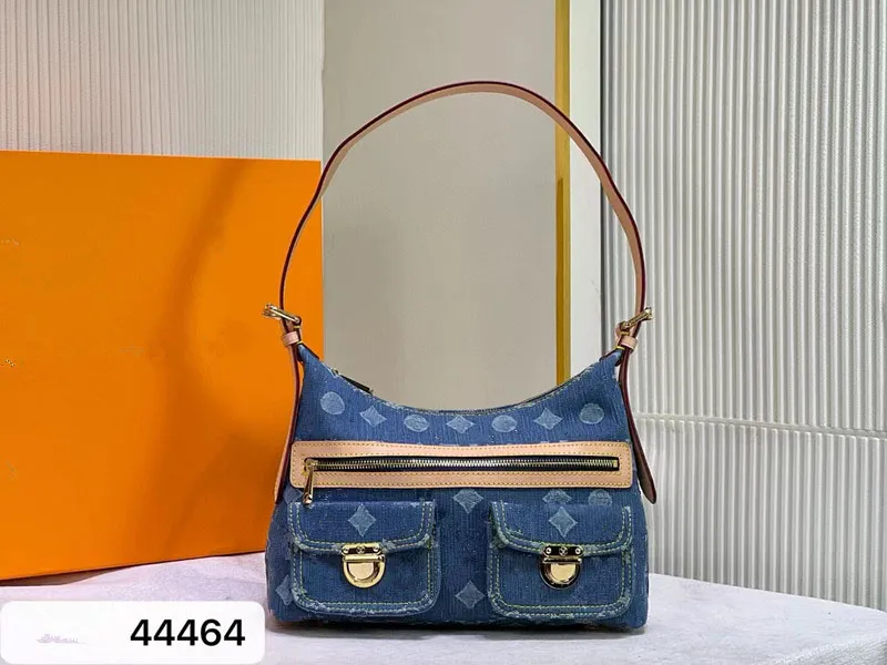 Designväska vintage kvinnor axelväskor denim handväska lady clutch handväskor underarmspåse blå handväska lyx dam shopping väskor m44464 äkta läderband