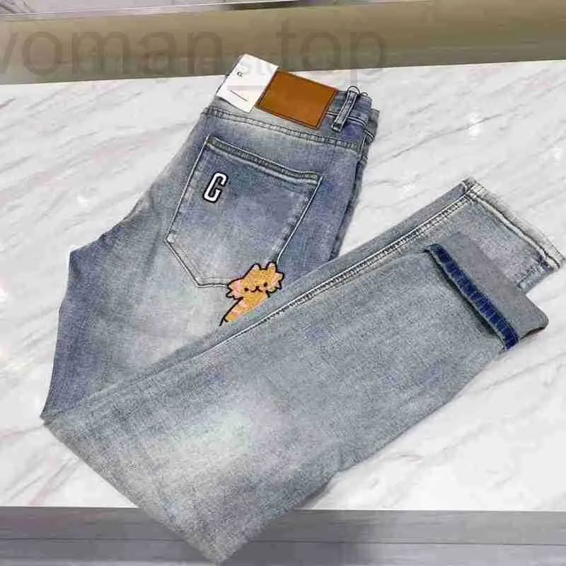 Jeans pour hommes Designer jeans pour hommes alphabet brodé dessin animé chaton jean coréen slim-fit pied élastique mode pantalon européen NEBD 846X