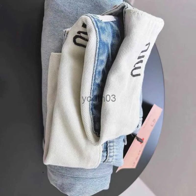 Jeans pour femmes 2024 nouveau jean jambe pantalon taille basse Miu rouleau taille lettre broderie designer look mince et couvrez vos hanches 240304