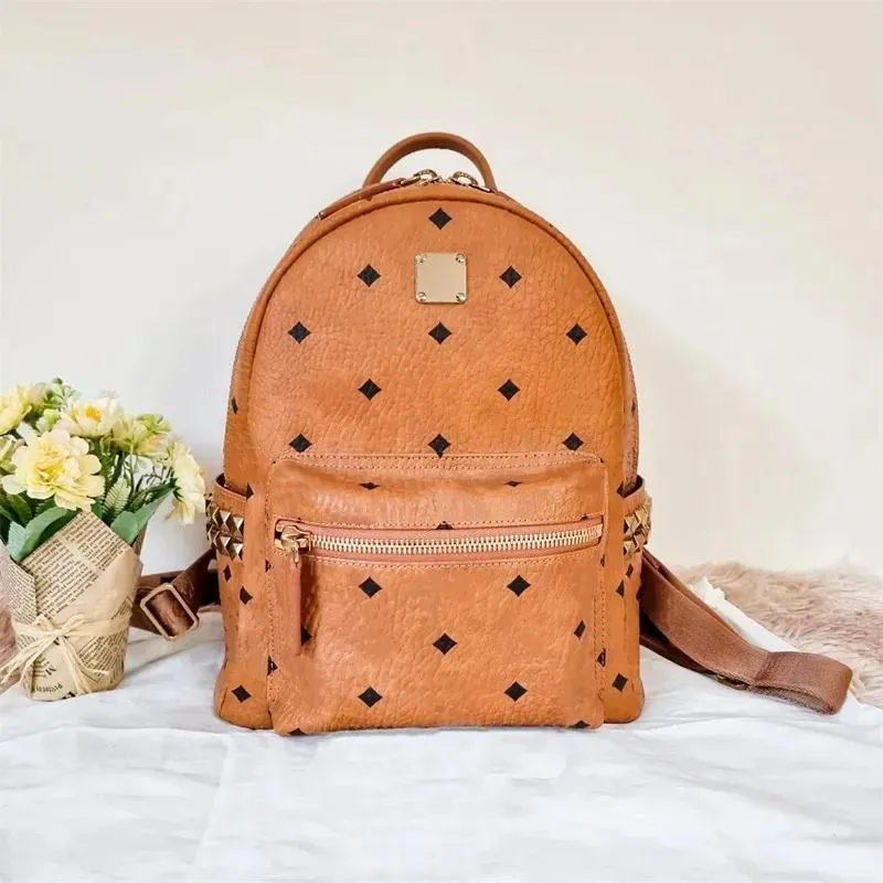 Vintage MC backpack Cross Body Shoulder bag Womens luxury handbag two straps schoolbag Clutch Totes bag fashion mens real Leather zipper laptop brown Designer bags