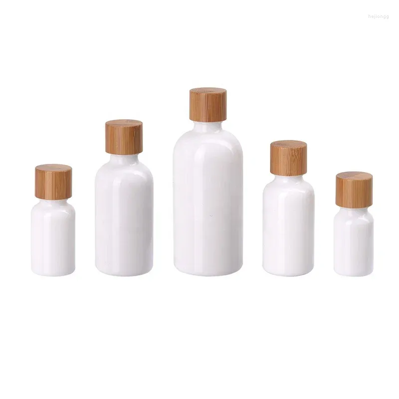 Butelki do przechowywania 10 ml 15 ml 1 uncji 50 ml 100 ml szklanki szklanej butelki olejku eterycznego Opustę biały pojemnik z bambusową śrubą i hurtową reduktorem