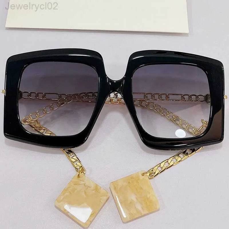 womens sunglasses 0722S fashion classic shopping black plate big frame metal chain temple with pendant leisure beach vacation glasses designer UV400 prote