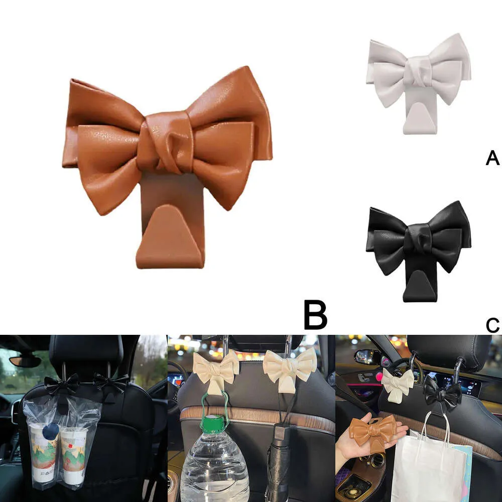 Novo assento traseiro bowknot armazenamento gancho couro do plutônio moda bolsa titular universal clipes de fixação automática para acessórios do carro w9j0