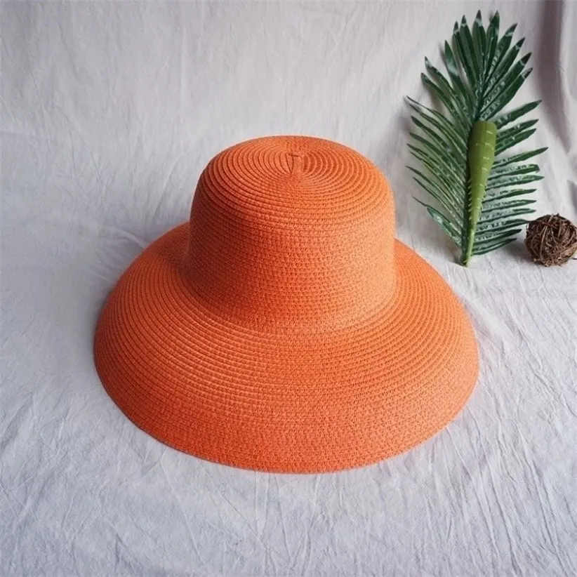 Vintage Sunshade Hat Ladies Saf Renk Hepburn Tarzı Tatil 5658cm Zarif Yaz Moda Yüksek Kaliteli Hasır Şapka 2205269J