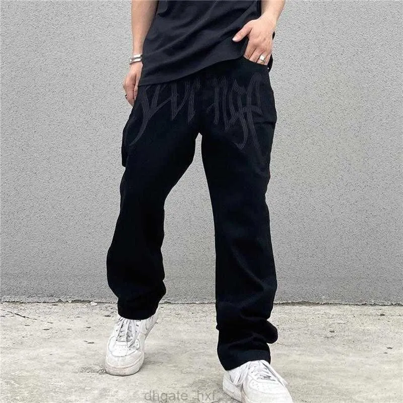 Jeans en jean pour hommes du dentoir en jean broderie noire streetwear streetwear basse hauteur pantalon hip hop baissé