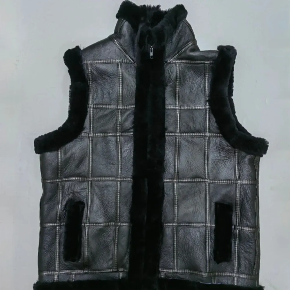 Gilet Pelliccia calda di montone ispessita invernale integrata con colletto in piedi in vera pelle gilet di lana nera da donna